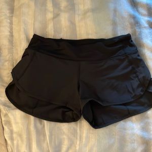 Lululemon running shorts. Size 4. Black. Worn but great quality!
